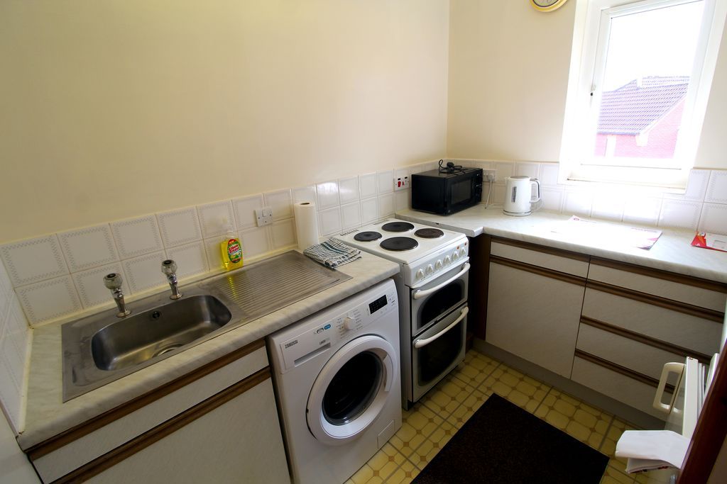 Property photo 3 of 7 Kitchen
