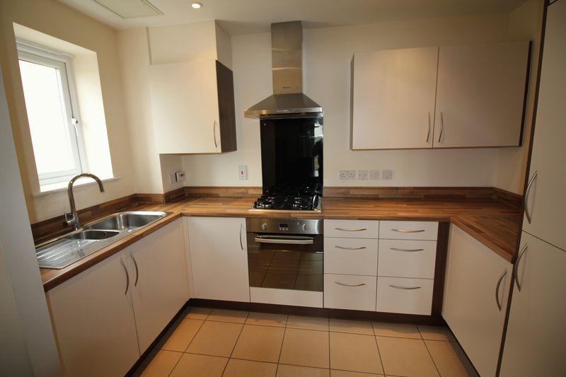 Property photo 2 of 9 Integrated Kitchen