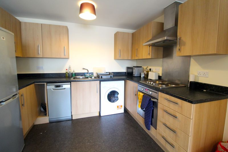 Property photo 3 of 7 Kitchen