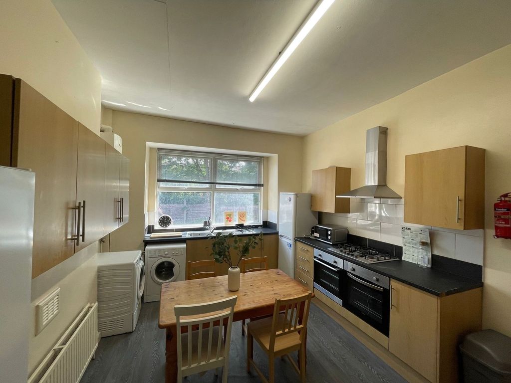 Property photo 3 of 19 Bright And Modern Kitchen Featuring A Large Window...
