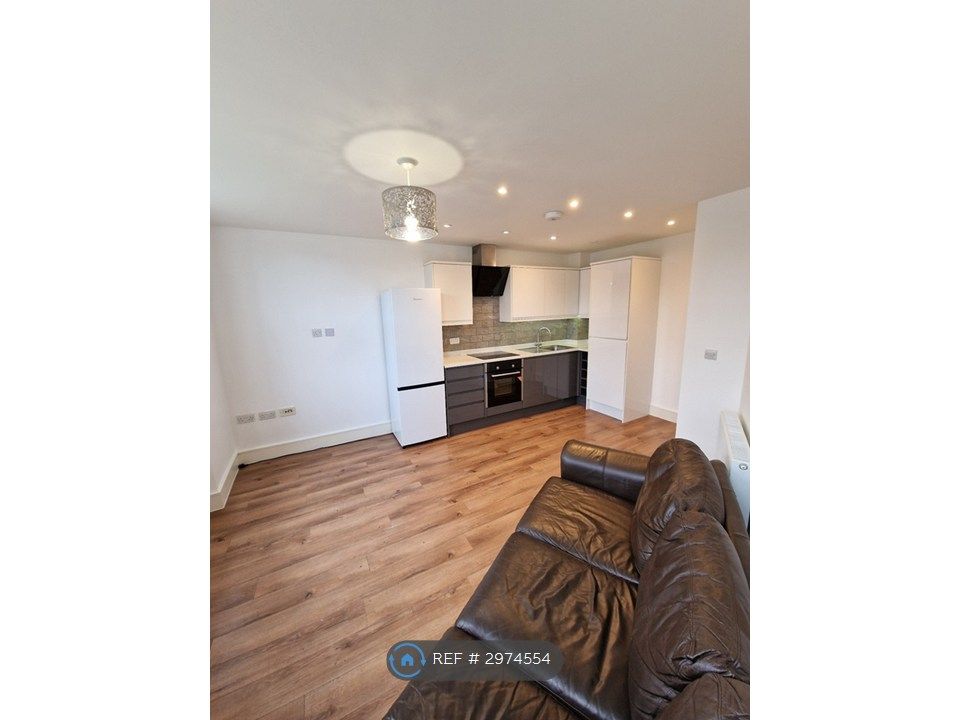 Property photo 2 of 12 Kitchen And Living Room