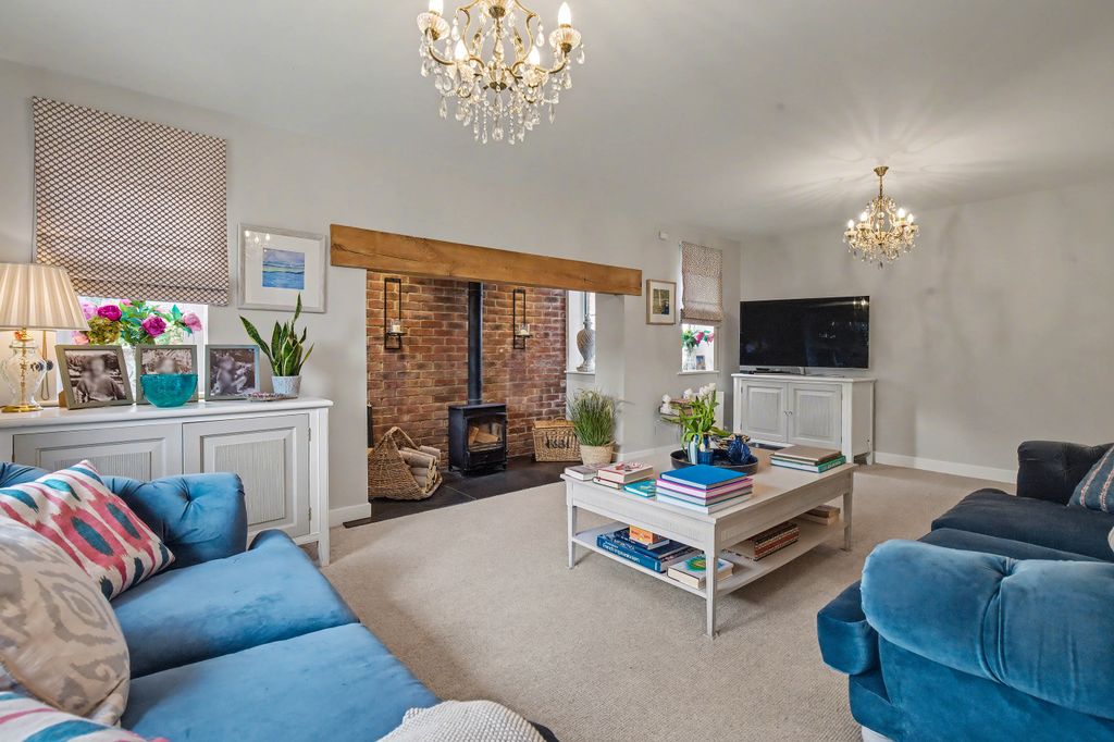 Property photo 2 of 24 Living Room - Angle 1