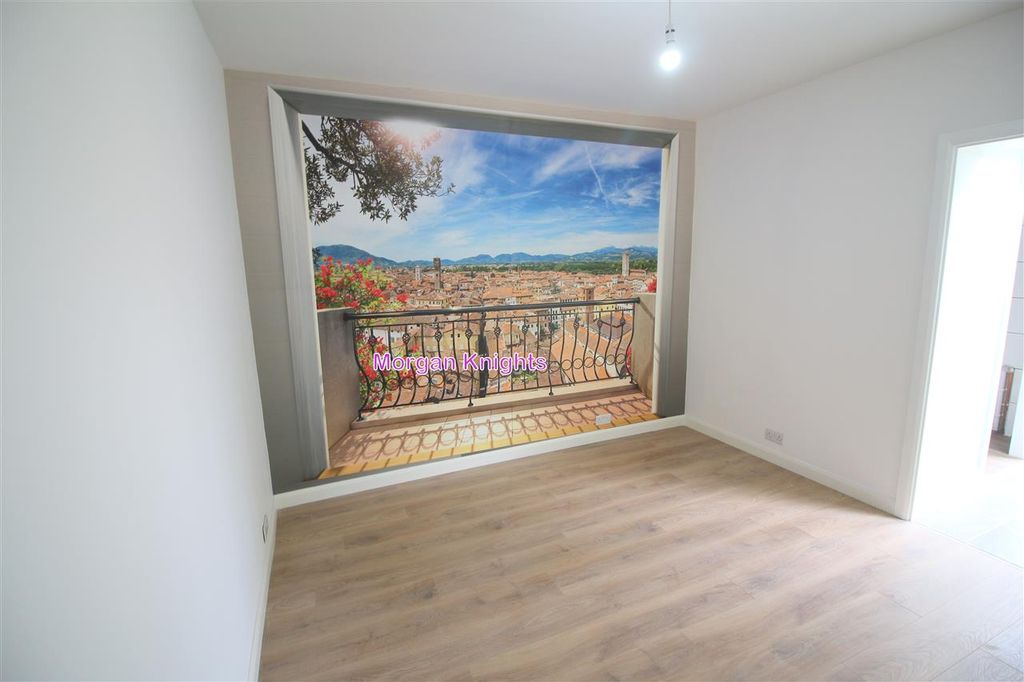 Property photo 2 of 16 Living Room: