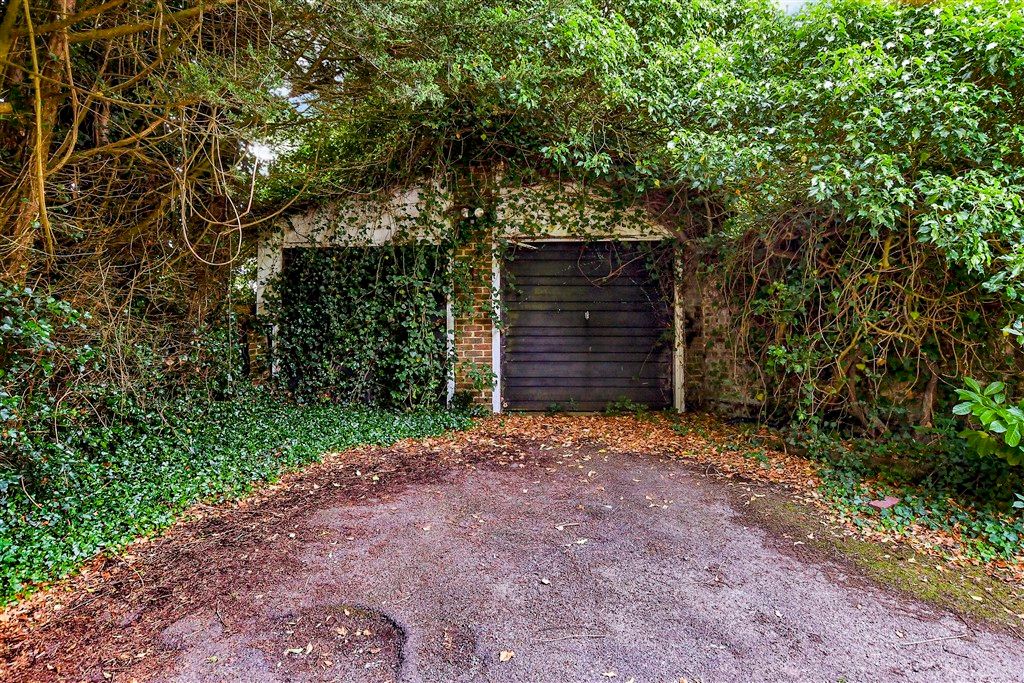 Property photo 2 of 12 Garage