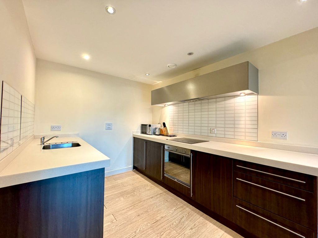 Property photo 2 of 12 Kitchen