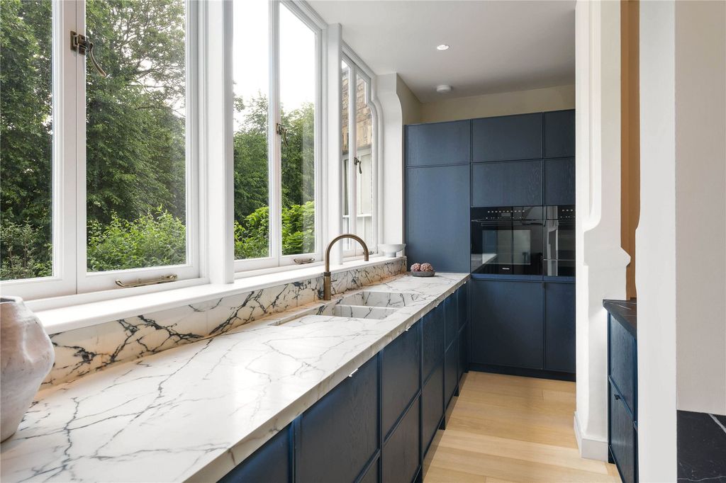 Property photo 3 of 12 Kitchen