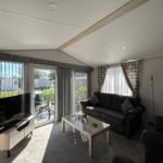 Property photo 2 of 7 Bright Lounge With Patio Doors Opening Onto The Decking