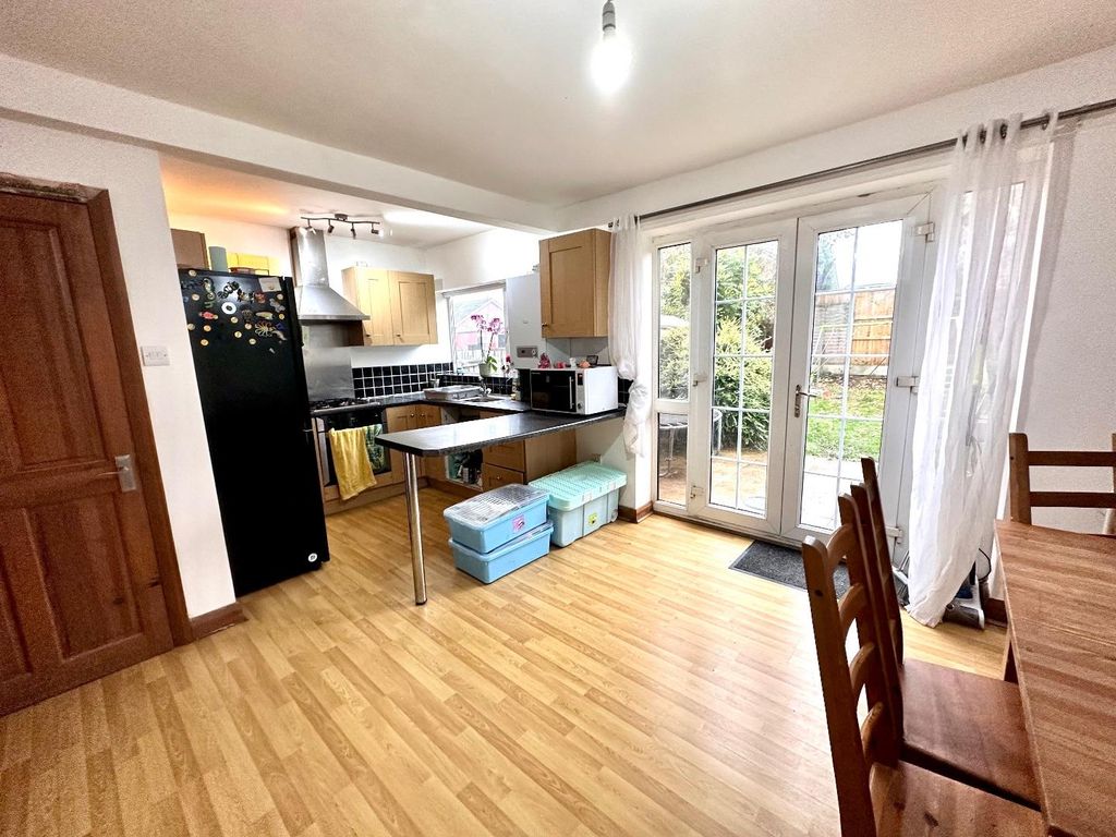 Property photo 3 of 17 Dining Kitchen