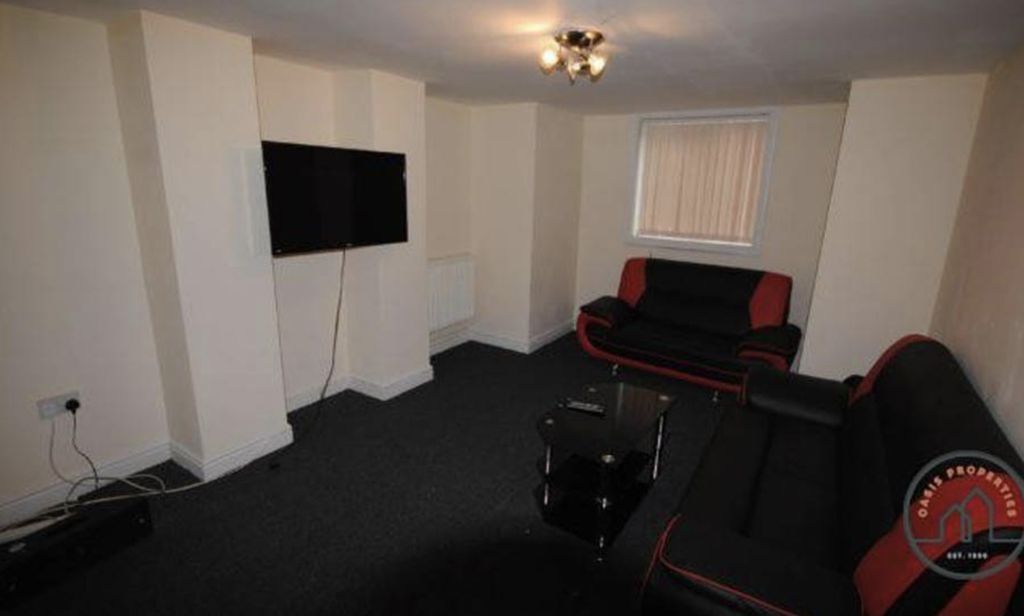 Property photo 1 of 3 A Cozy And Neatly Maintained Living Room Featuring...