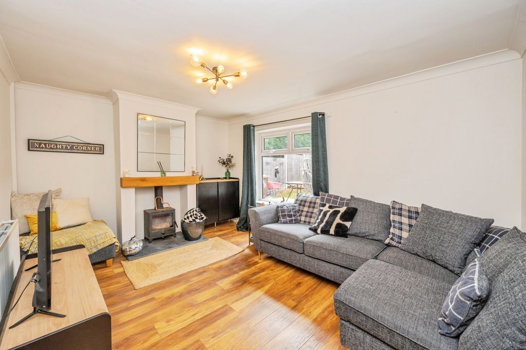 Property photo 3 of 20 Lounge With Feature Log Burner