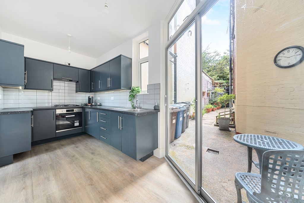Property photo 2 of 12 Kitchen And Courtyard - Ewemove Estate Agents