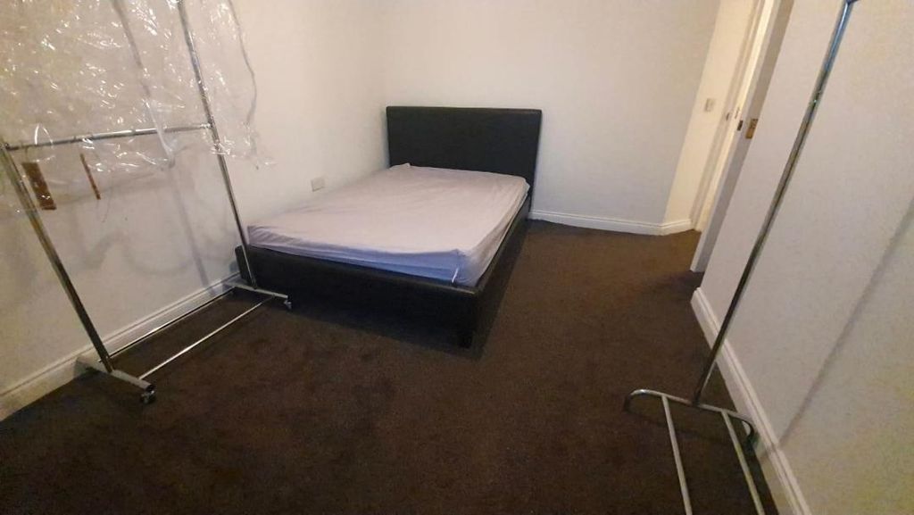 Property photo 3 of 19 Spacious Bedroom Featuring A Large Double Bed...