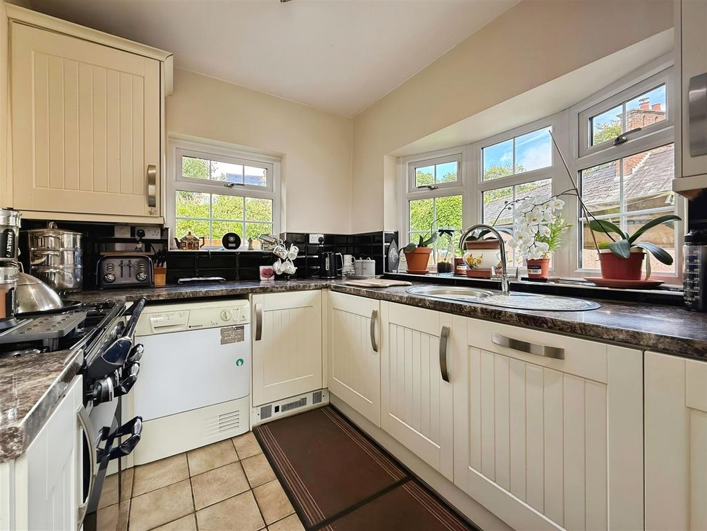 Property photo 2 of 27 Kitchen Area