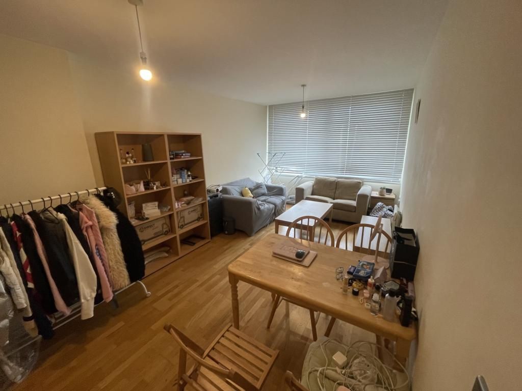 Property photo 1 of 13 A Cozy Double Bedroom Featuring A Wooden Floor, A ...