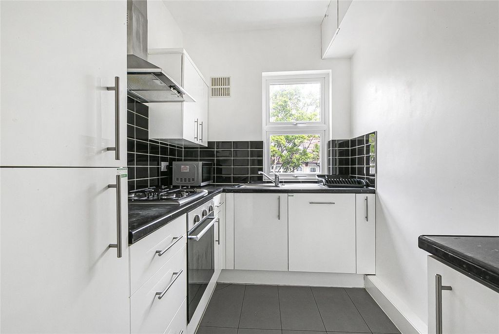 Property photo 3 of 12 Kitchen