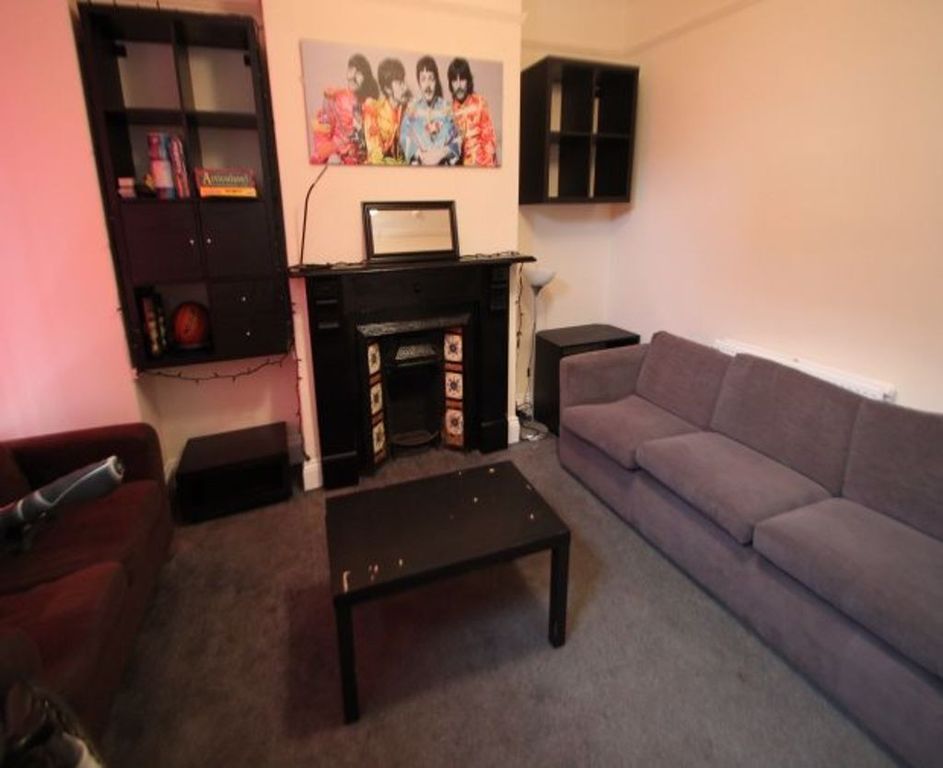 Property photo 2 of 13 A Contemporary Living Room Featuring A Large Grey ...