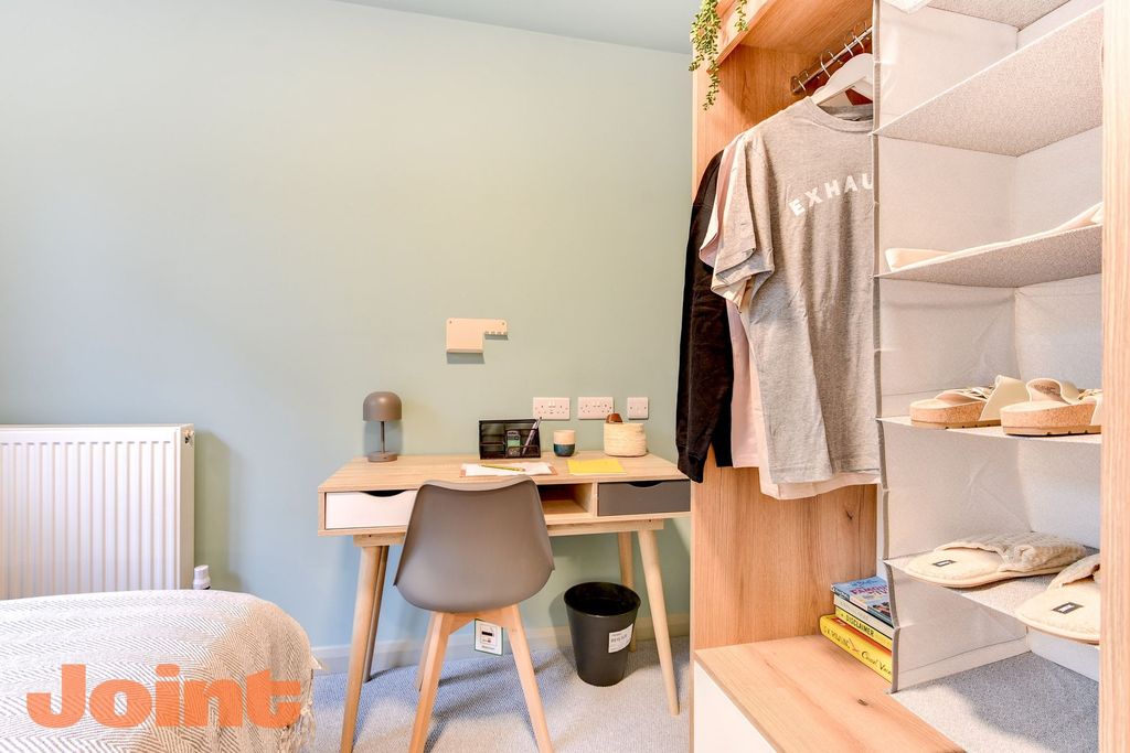 Property photo 3 of 12 Bright Workspace With Modern Desk And Storage...