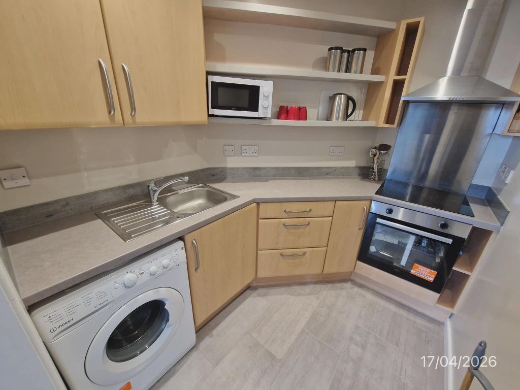 Property photo 3 of 9 Kitchen