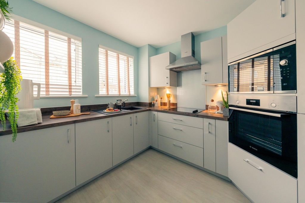 Property photo 2 of 4 Typical Kitchen