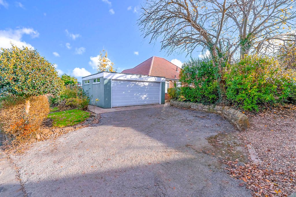 Property photo 2 of 12 Garage &amp; Driveway