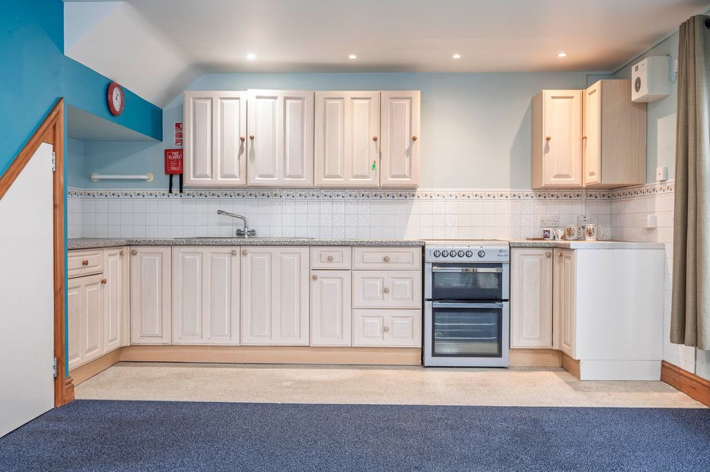 Property photo 2 of 15 Kitchen Area