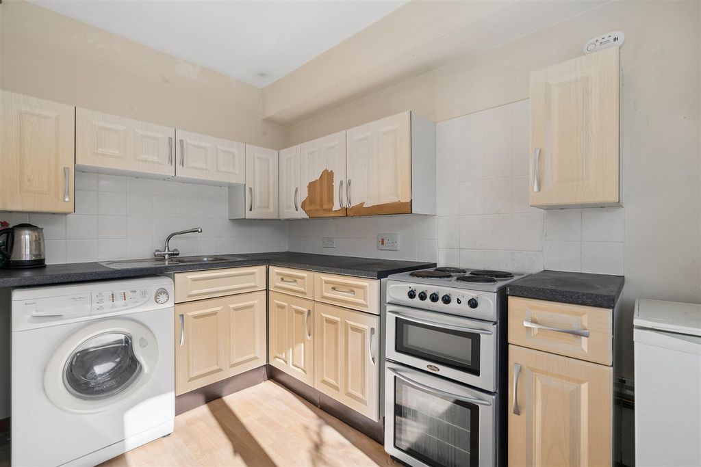 Property photo 2 of 5 Cloisters House, Griffiths Road, Sw19 1Ss Kitchen