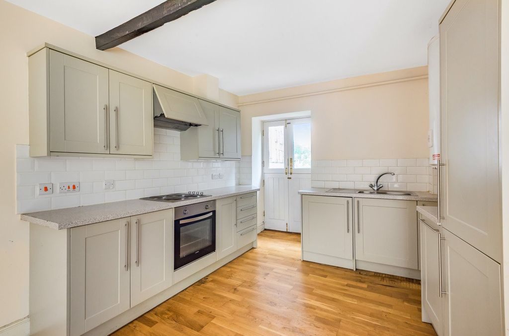 Property photo 2 of 13 Kitchen Area