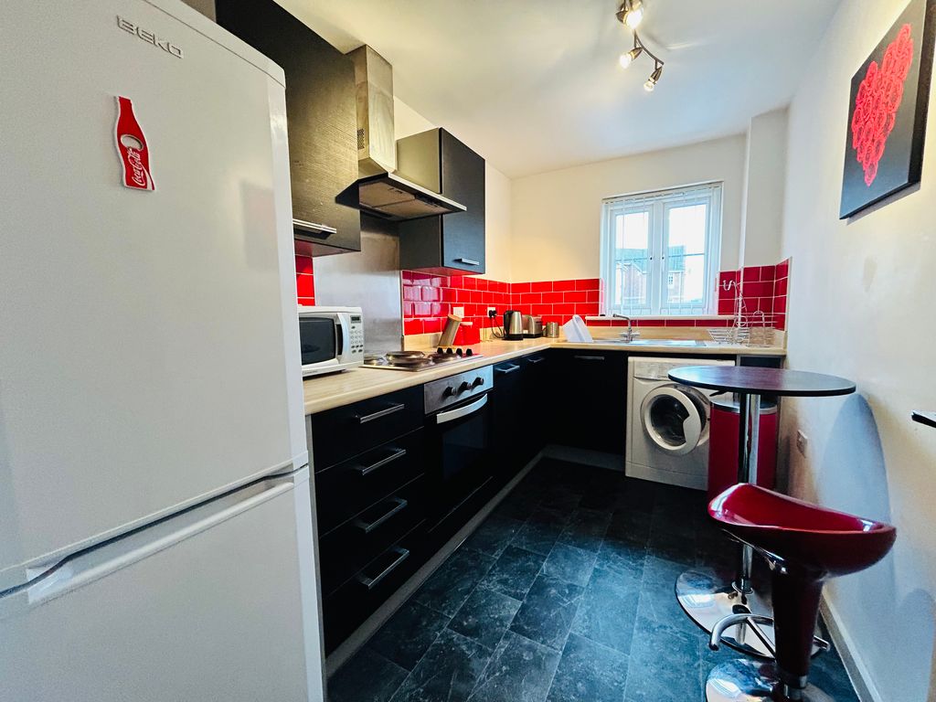 Property photo 2 of 7 Kitchen