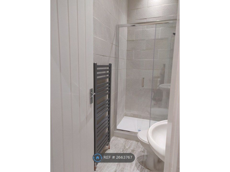 Property photo 2 of 15 Shower & Toilet