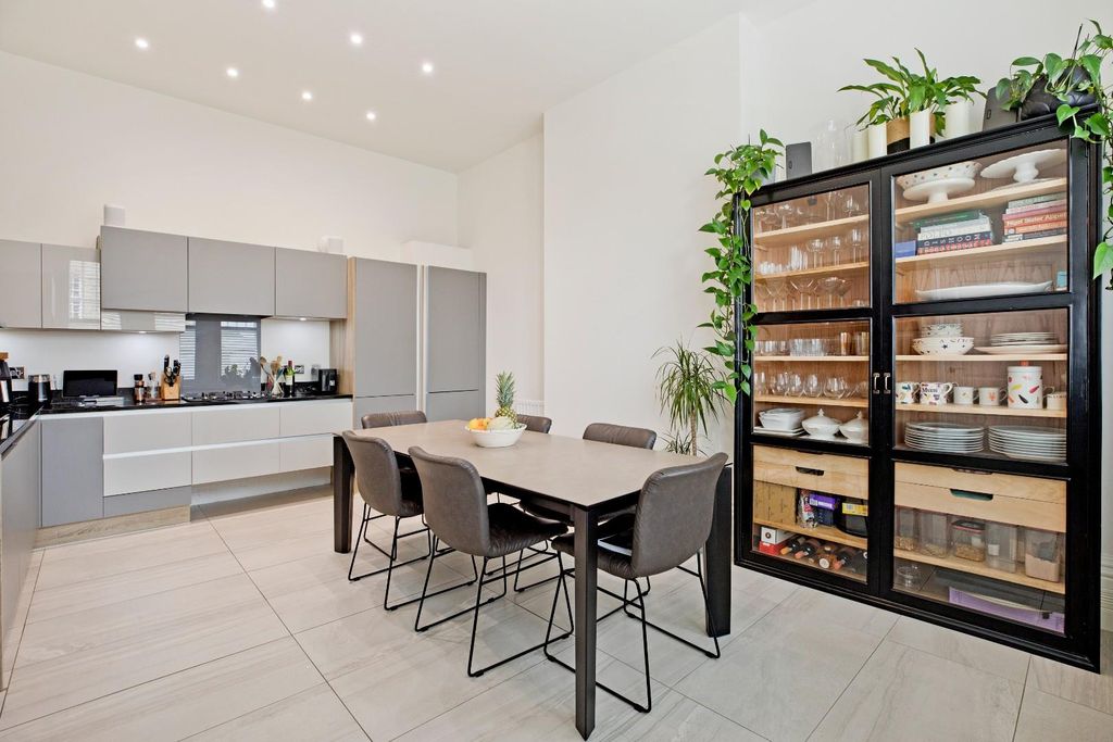 Property photo 3 of 32 Dining Kitchen