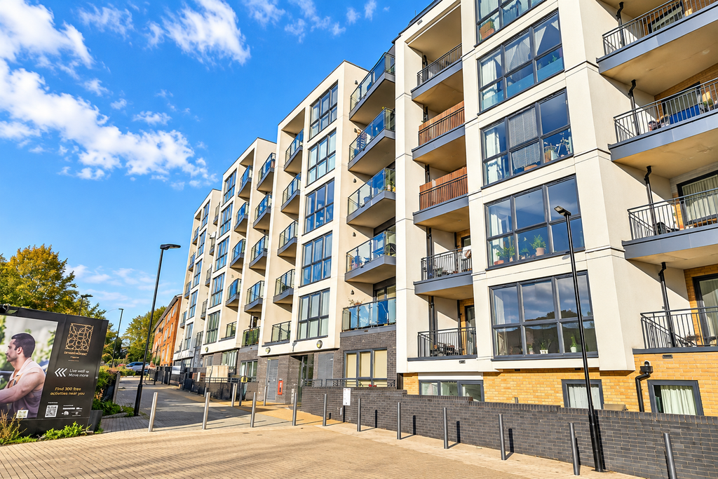 Property photo 1 of 8 Sunny Modern Apartment Complex Facade