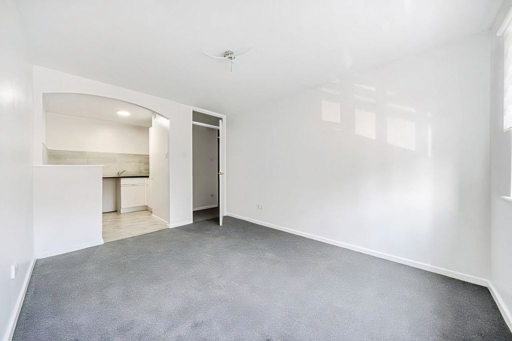 Property photo 3 of 12 Living Room