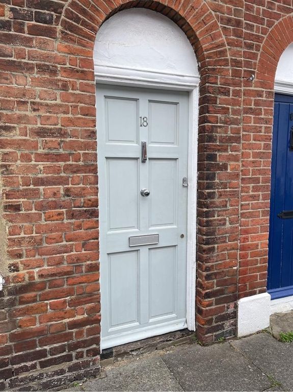 Property photo 1 of 10 Charming Brick Exterior With A Stylish Front Door...