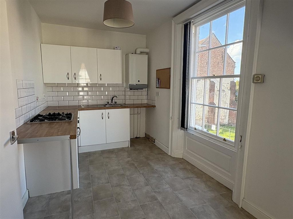 Property photo 2 of 6 Bright Kitchen With Large Window And Sleek Units...
