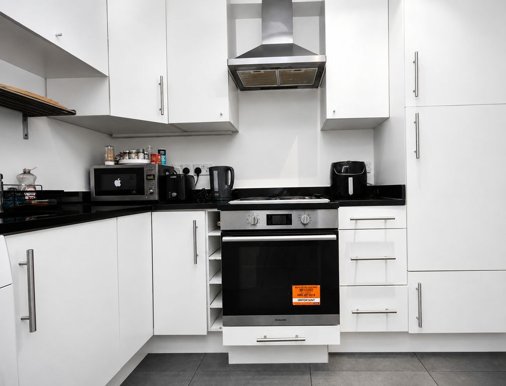 Property photo 1 of 8 Kitchen