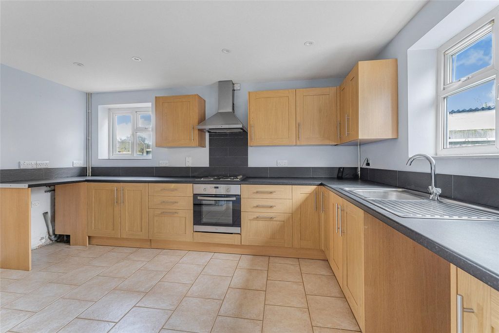 Property photo 2 of 9 Kitchen