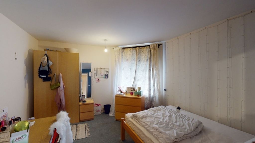 Property photo 2 of 4 A Cozy Double Bedroom Featuring Ample Storage And ...