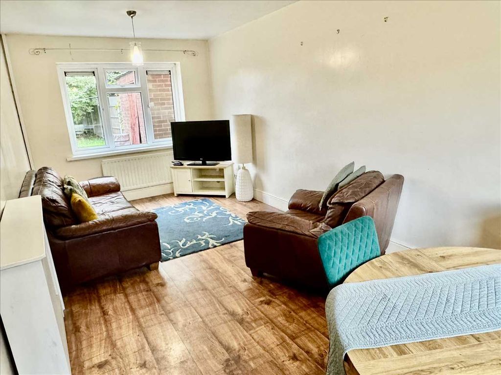 Property photo 2 of 8 Living Room