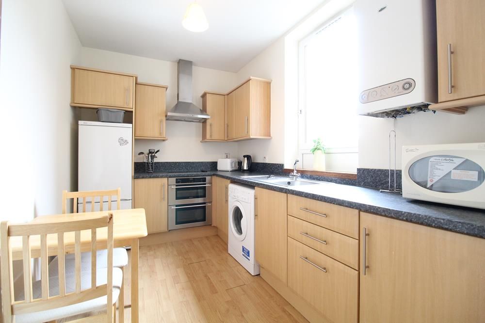 Property photo 3 of 7 Kitchen