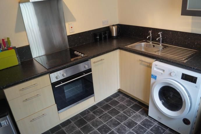 Property photo 2 of 8 Kitchen