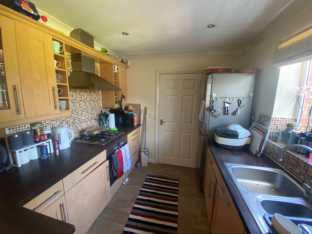 Property photo 3 of 13 Kitchen