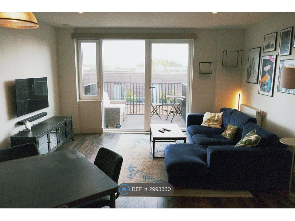Property photo 3 of 14 Living Room And Balcony Doors
