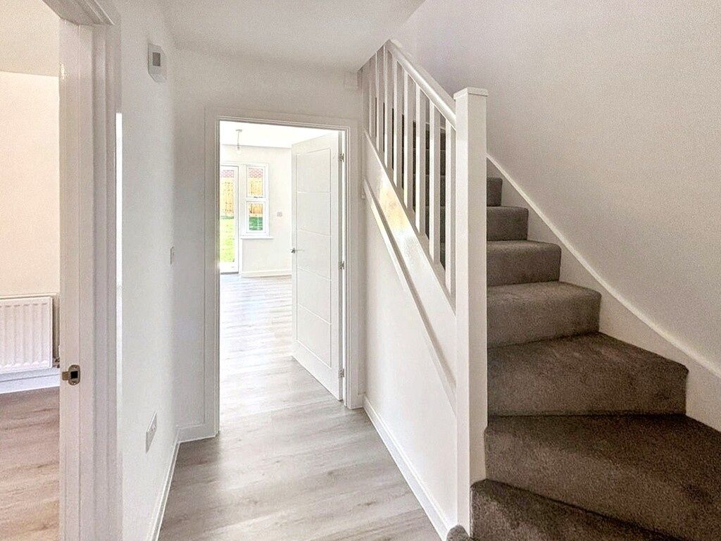 Property photo 2 of 13 Bright, Clean Entrance Hallway With Light Wood-Eff...
