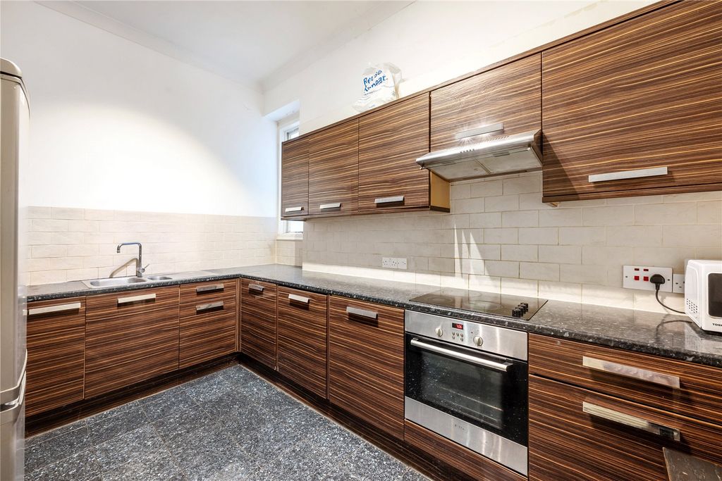 Property photo 3 of 12 Kitchen