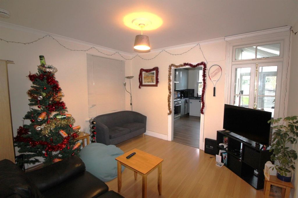 Property photo 2 of 10 Front Room.Jpg