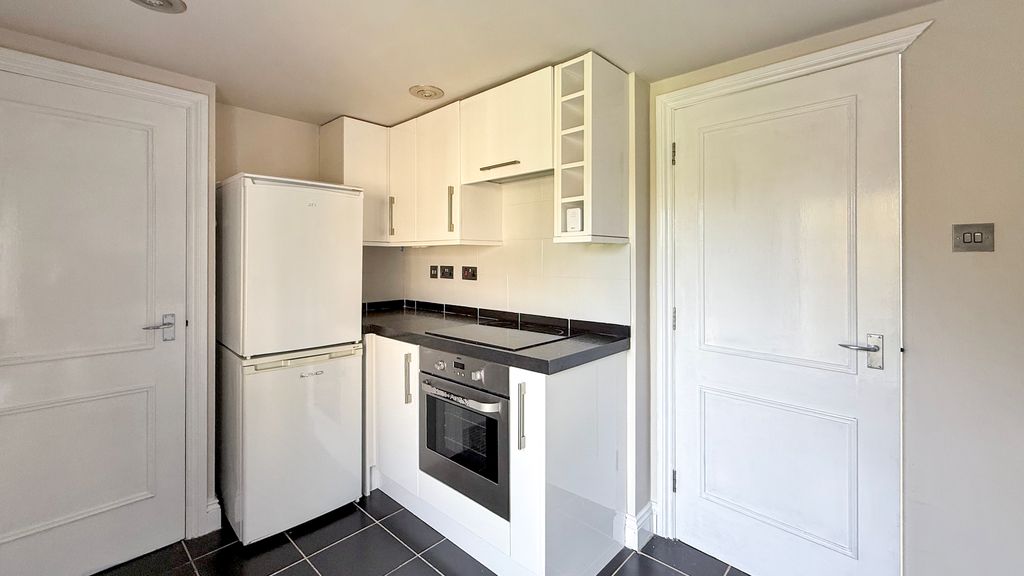 Property photo 3 of 12 Kitchen