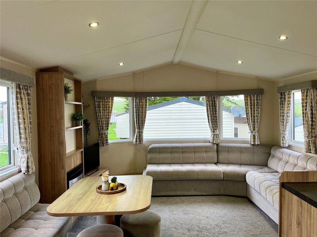 Property photo 3 of 16 Lounge/Dinning Area