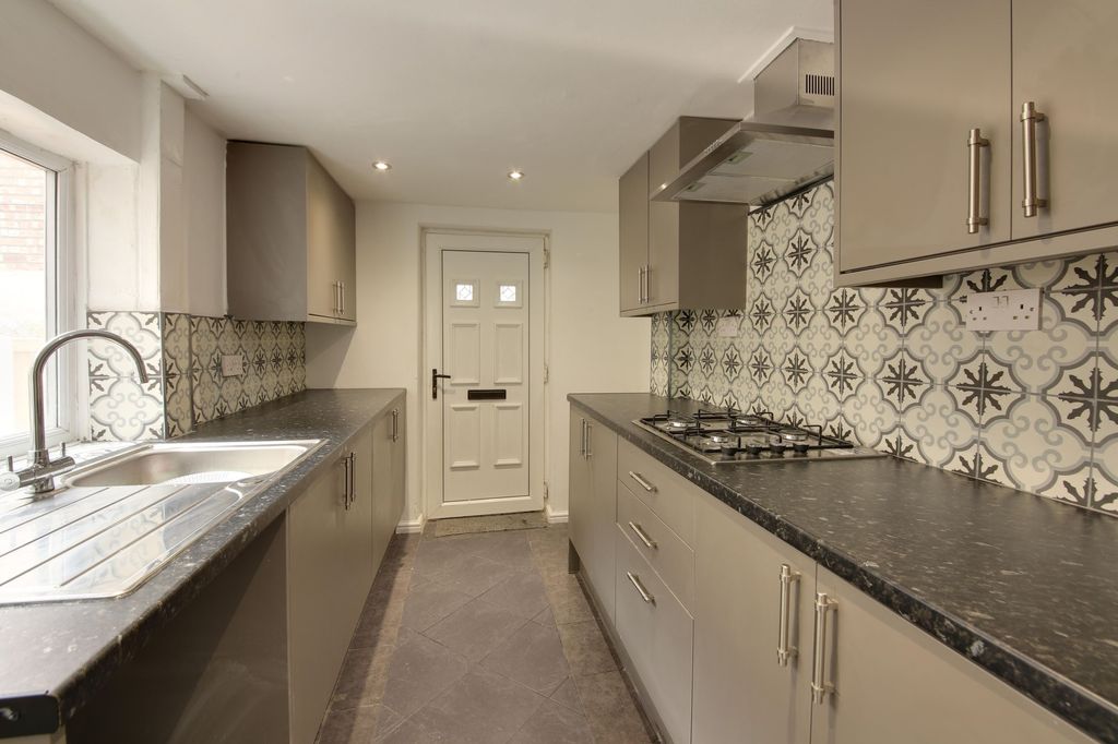 Property photo 1 of 12 Kitchen