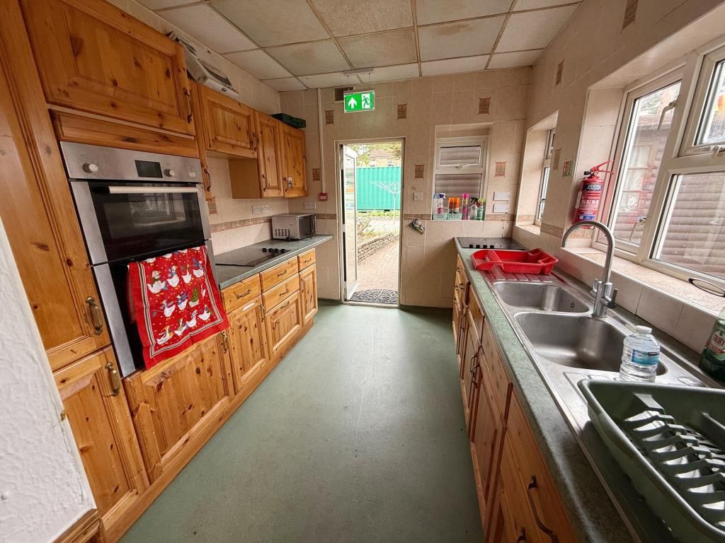 Property photo 2 of 9 Galley Style Kitchen