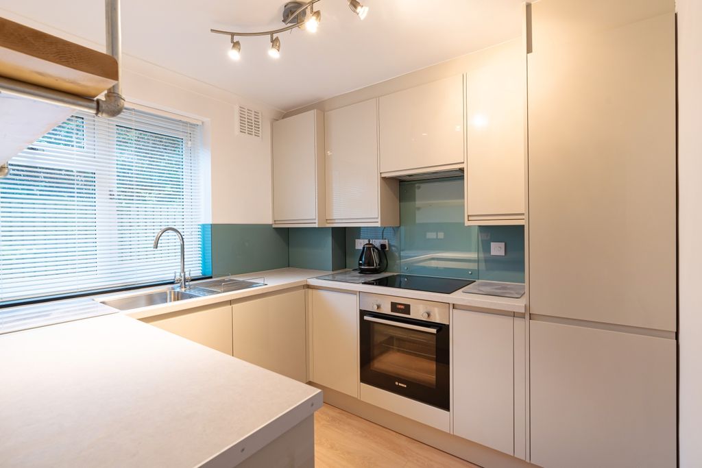 Property photo 3 of 12 Kitchen